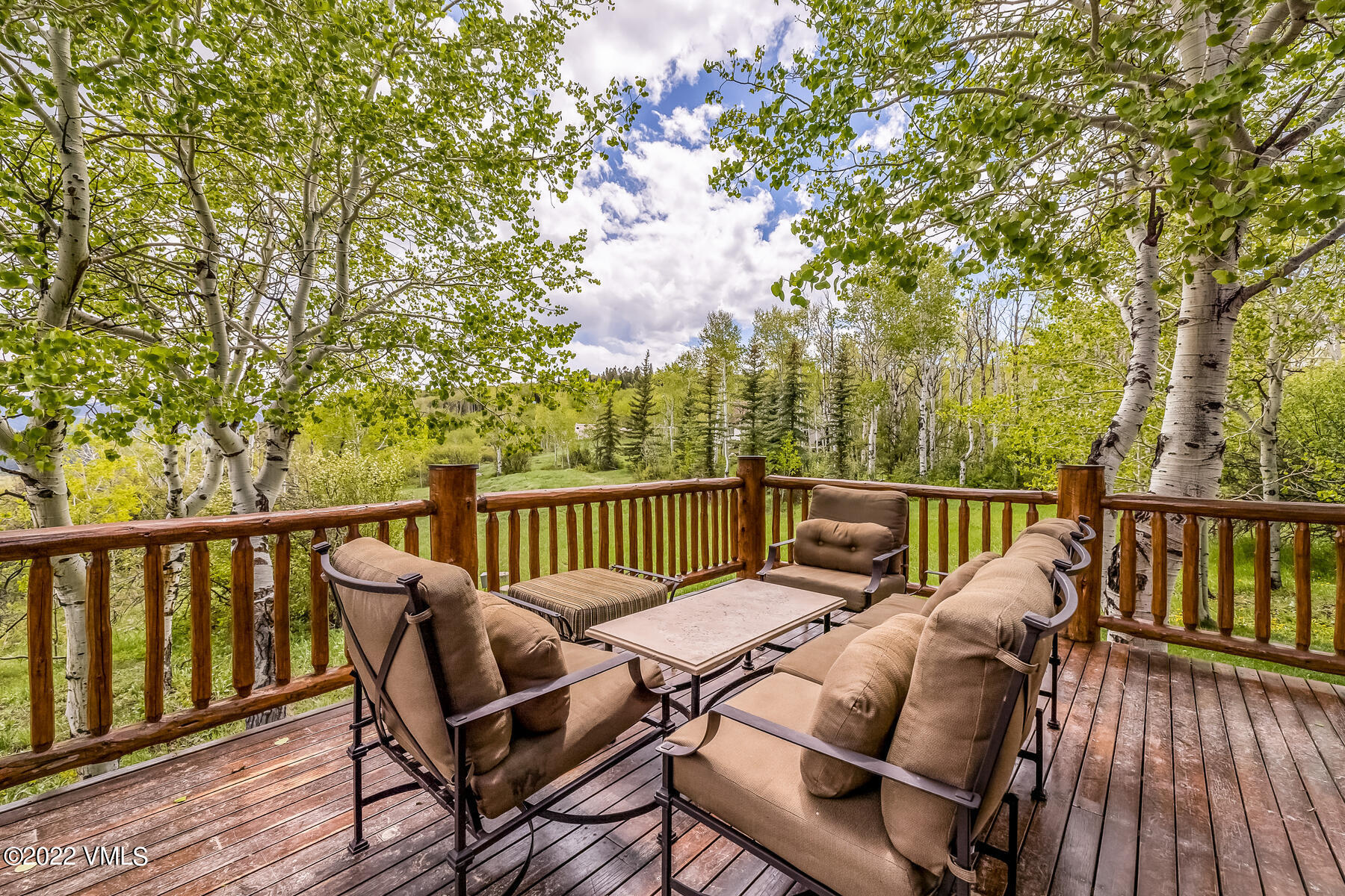 4000 Bellyache Ridge Road Wolcott, CO 81655 - Photo 7 of 56 a view of a balcony with wooden floor and outdoor space