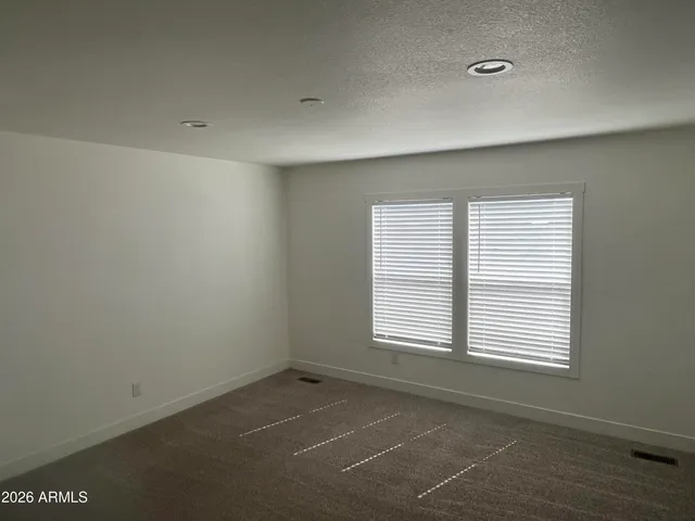 a bathroom with a sink toilet and mirror