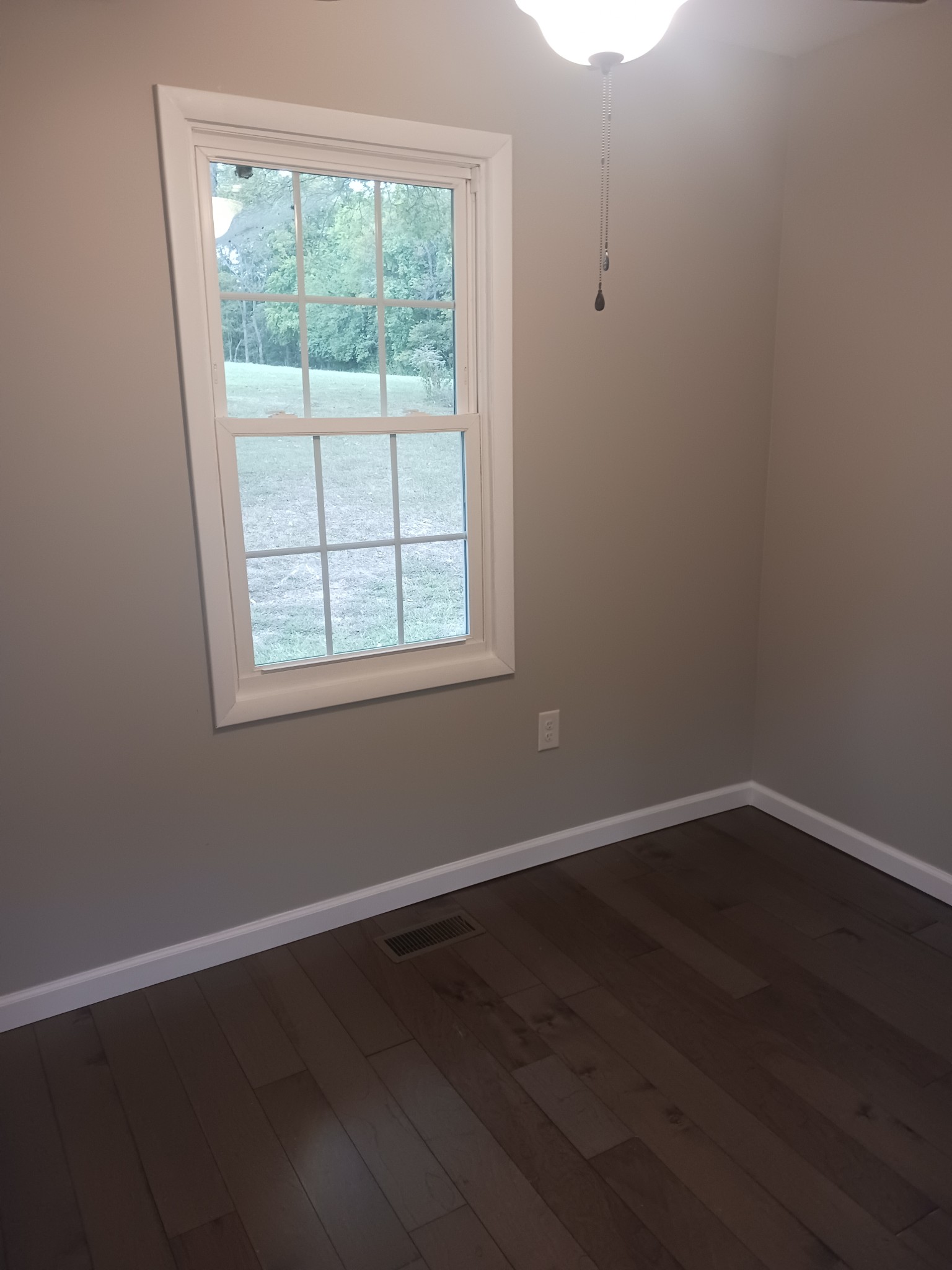 1263 Avondale Road, Unit STE B Hendersonville, TN 37075 - Photo 10 of 12 an empty room with wooden floor and windows