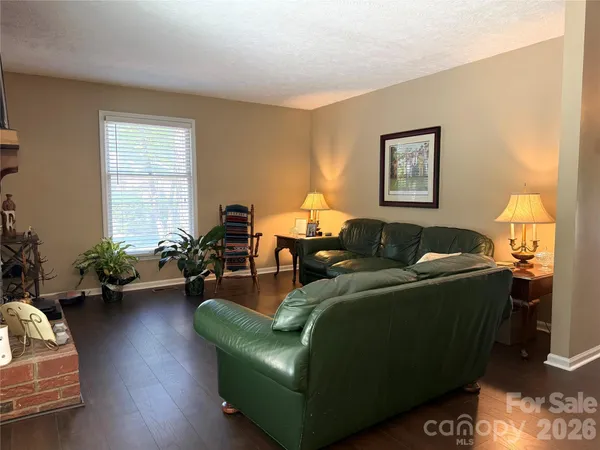 a view of a hallway with a white walls