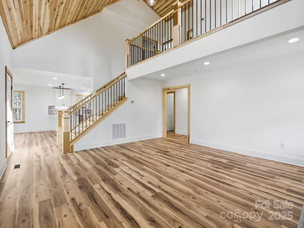 a view of entryway with wooden floor