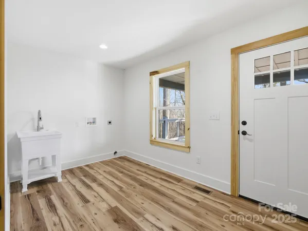 a view of empty room with windows