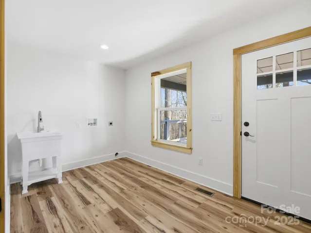 a view of empty room with windows