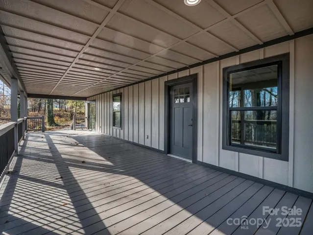 a front view of a house with a yard table and chairs