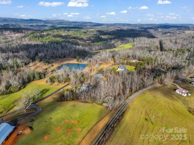 a view of a swimming pool and an outdoor seating