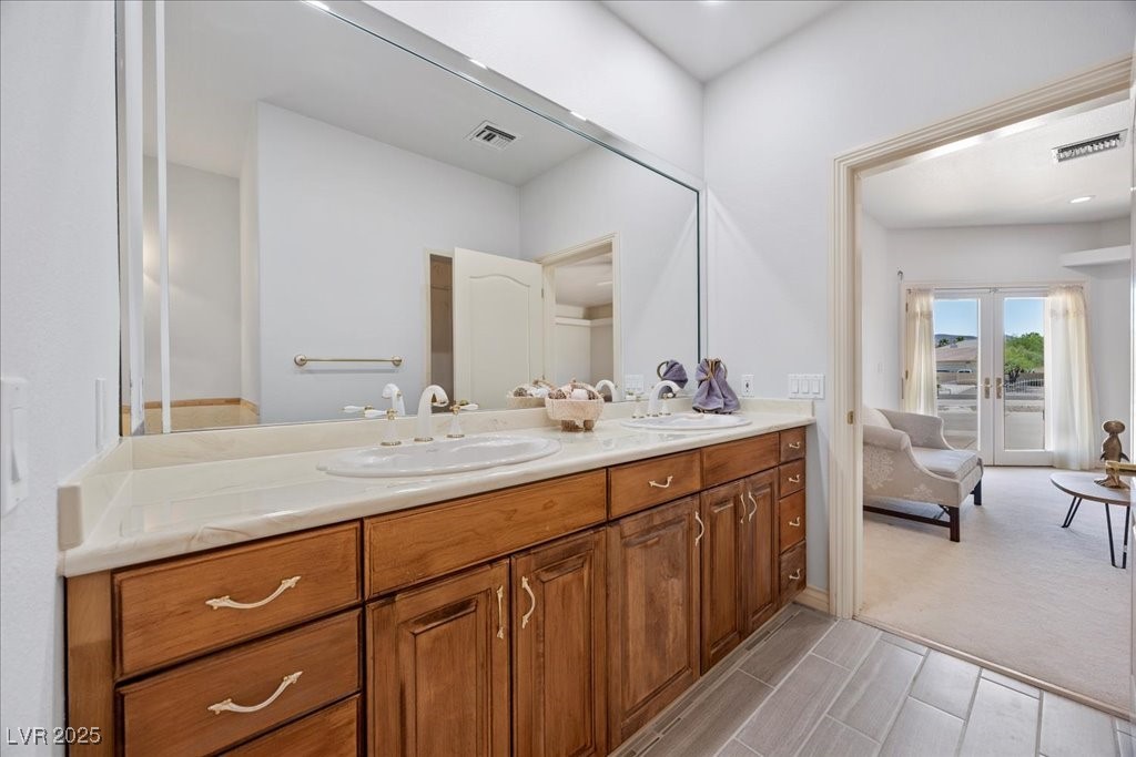 640 Quail Covey Road Henderson, NV 89002 - Photo 31 of 75 3rd Bedroom Bathroom featuring double vanity