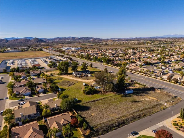 an aerial view of a city with ocean view