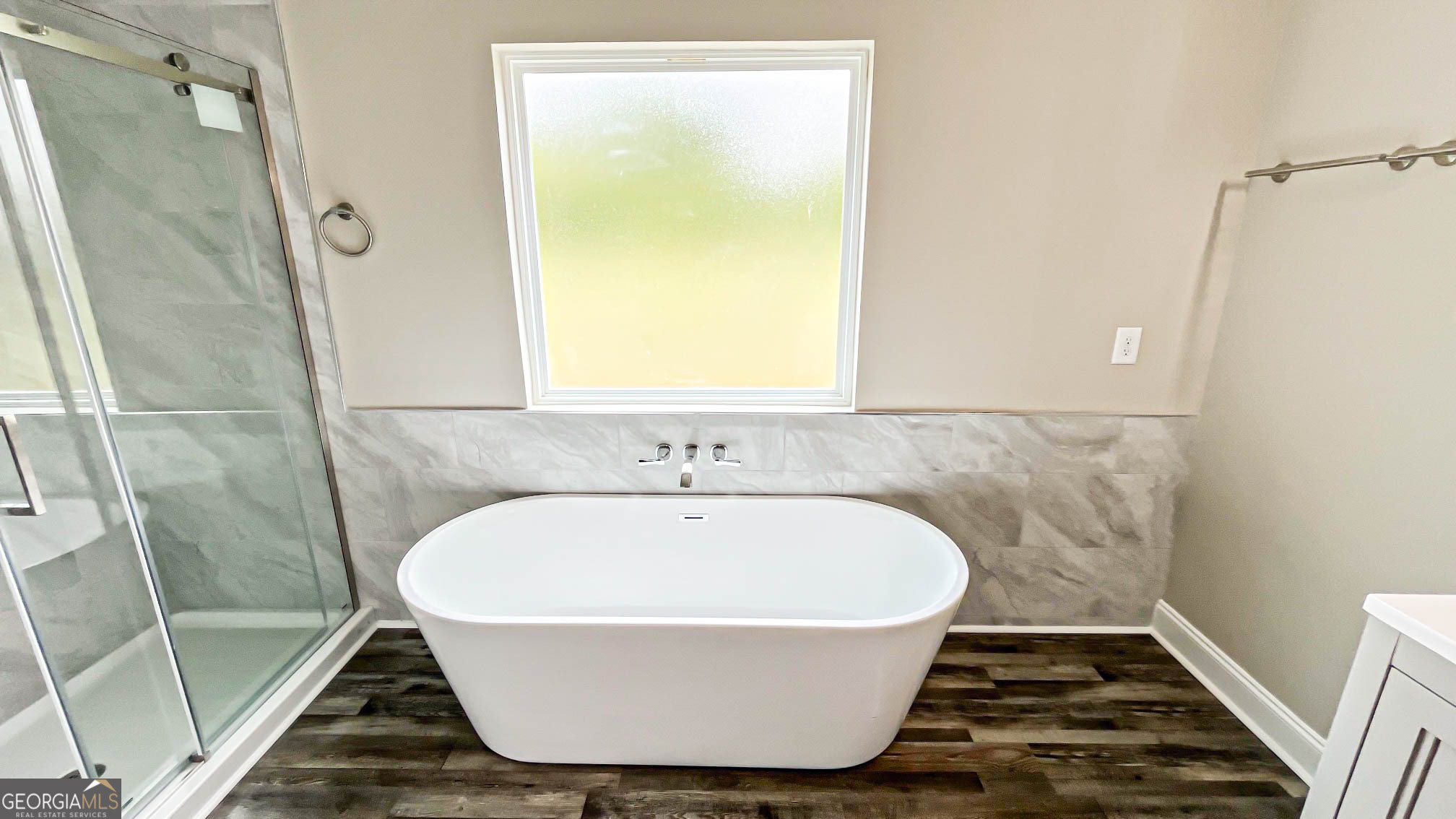 2011 Griffin Road Macon, GA 31216 - Photo 26 of 64 a bathroom with a bathtub and shower