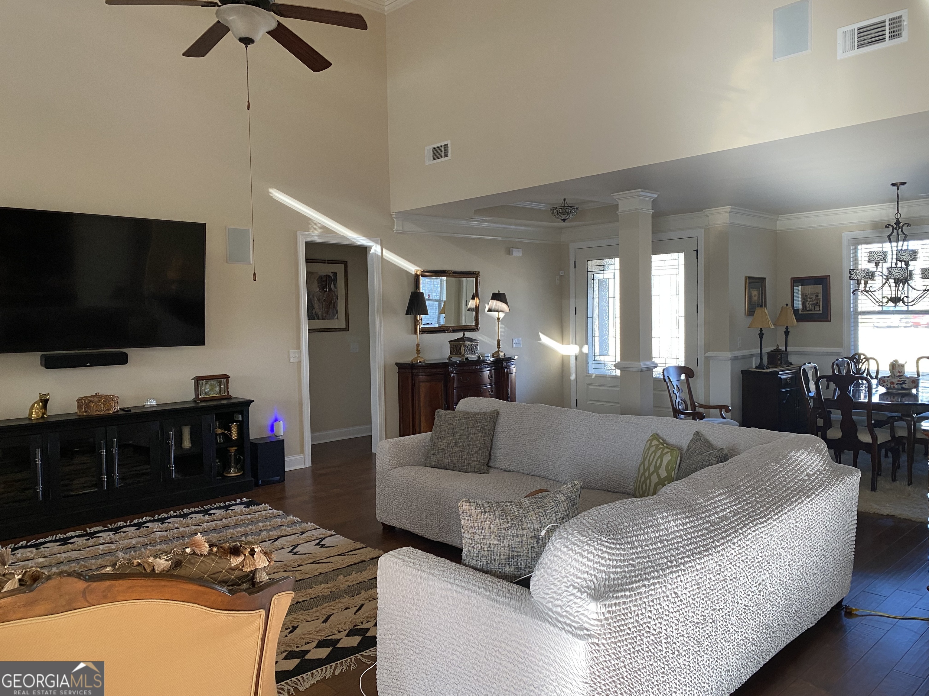 156 Elkins Boulevard Locust Grove, GA 30248 - Photo 18 of 36 a living room with furniture and a flat screen tv