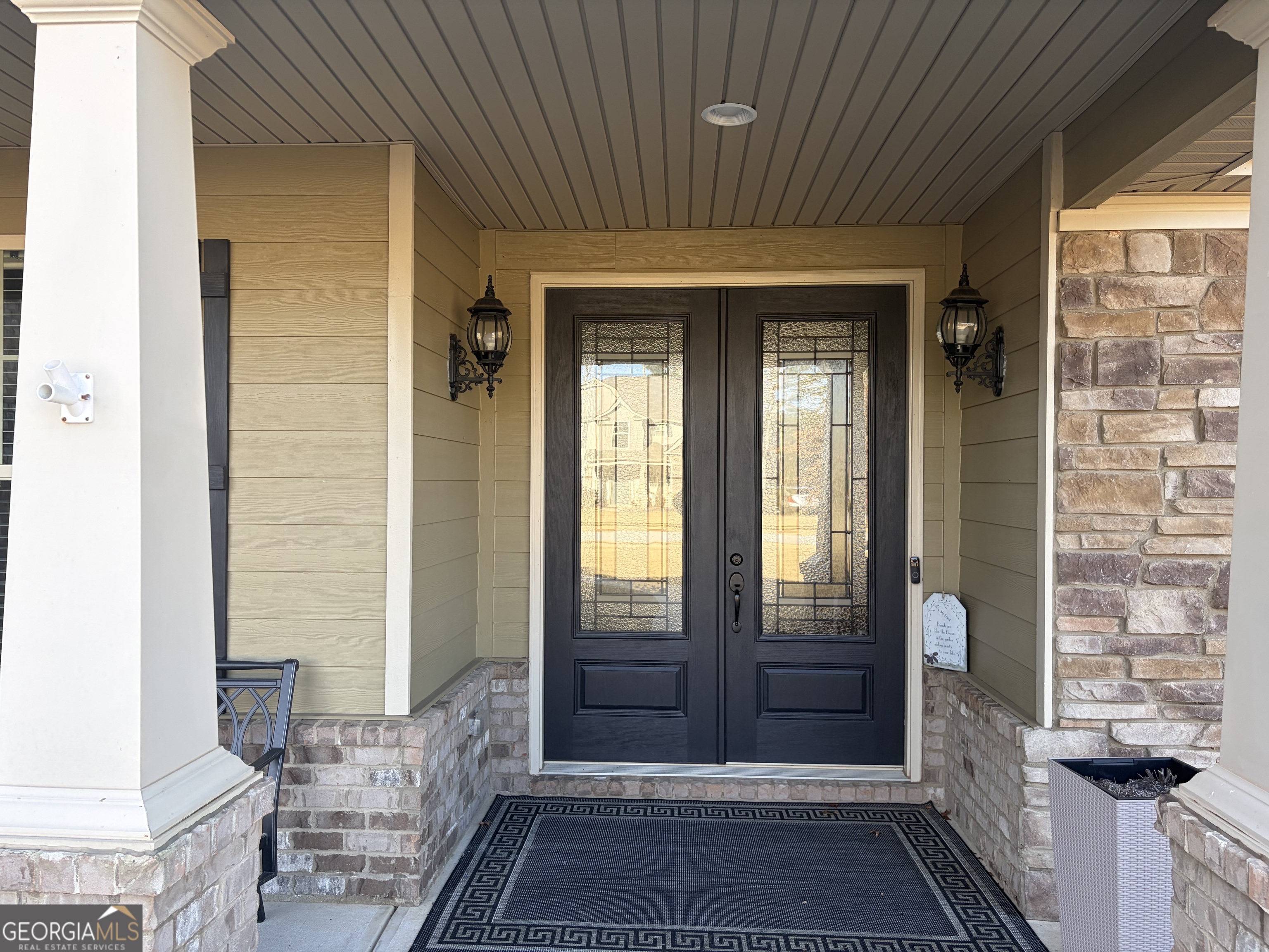 156 Elkins Boulevard Locust Grove, GA 30248 - Photo 19 of 36 a view of front door of house