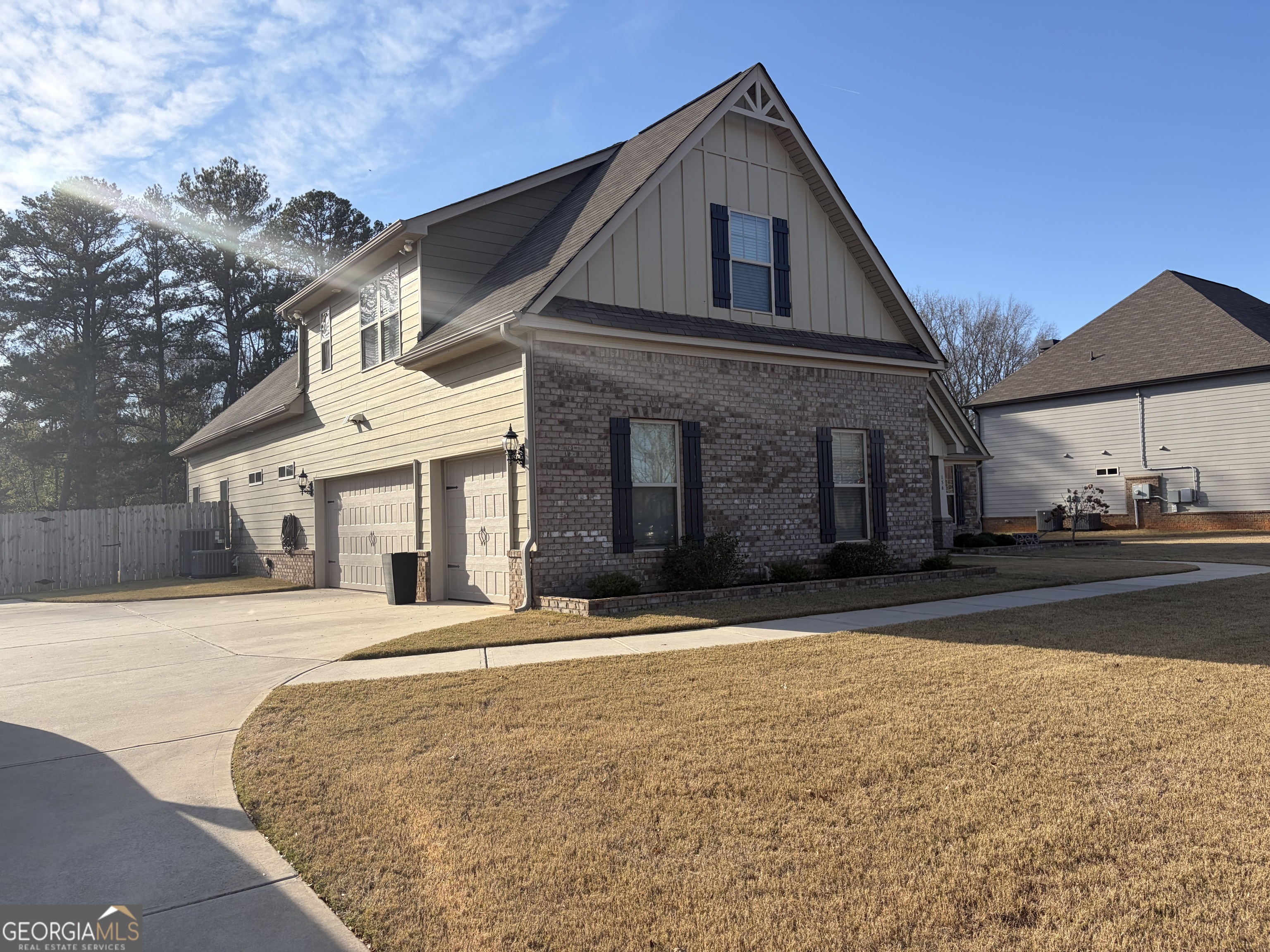 156 Elkins Boulevard Locust Grove, GA 30248 - Photo 21 of 36 a front view of a house with a yard