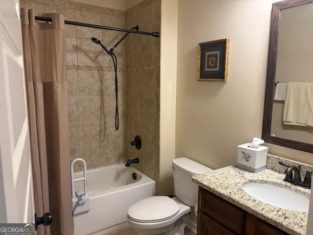 a building outdoor space with patio furniture and potted plants