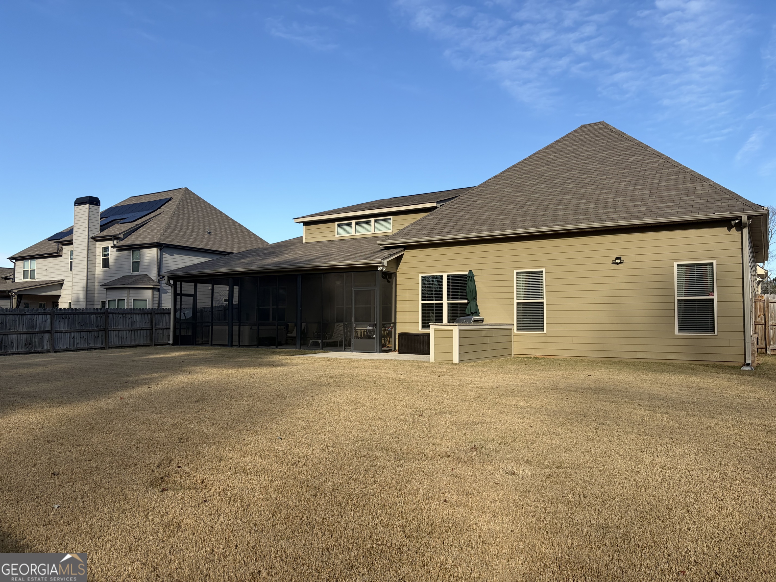 156 Elkins Boulevard Locust Grove, GA 30248 - Photo 26 of 36 a front view of a house with a yard