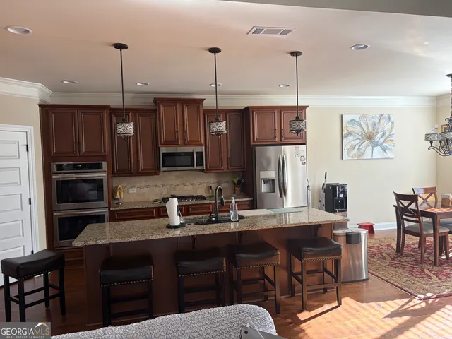 a en suite bathroom with a sink and a mirror