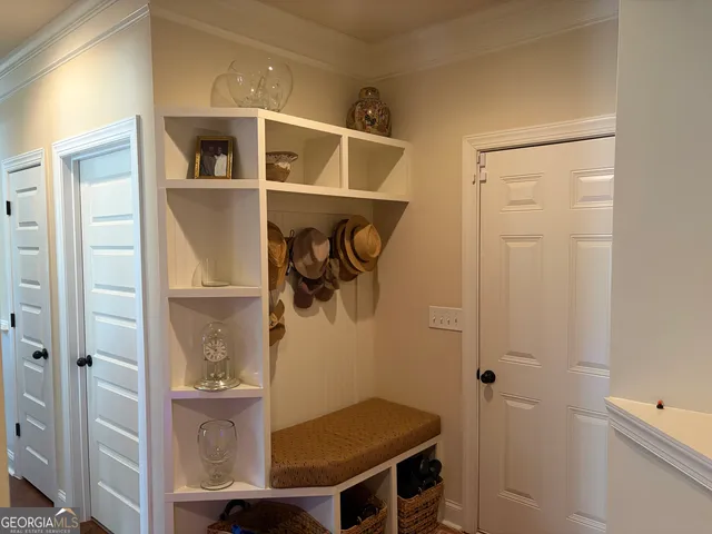 a view of a bathroom from a hallway