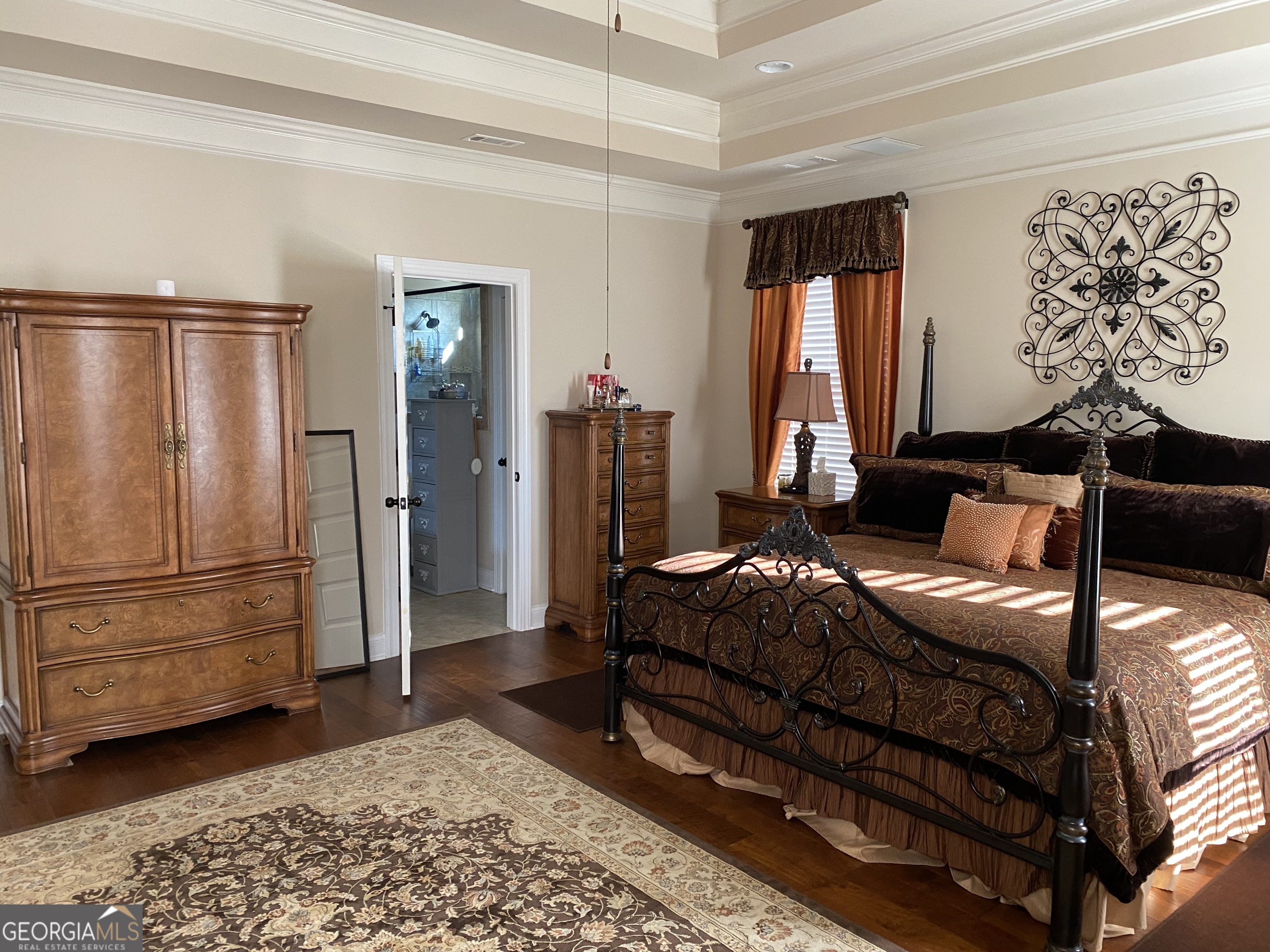 156 Elkins Boulevard Locust Grove, GA 30248 - Photo 6 of 36 a bedroom with a bed and a window