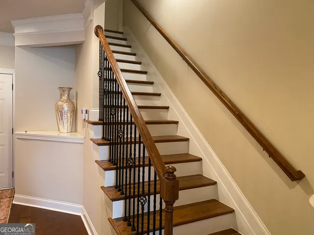 a view of entryway with wooden floor