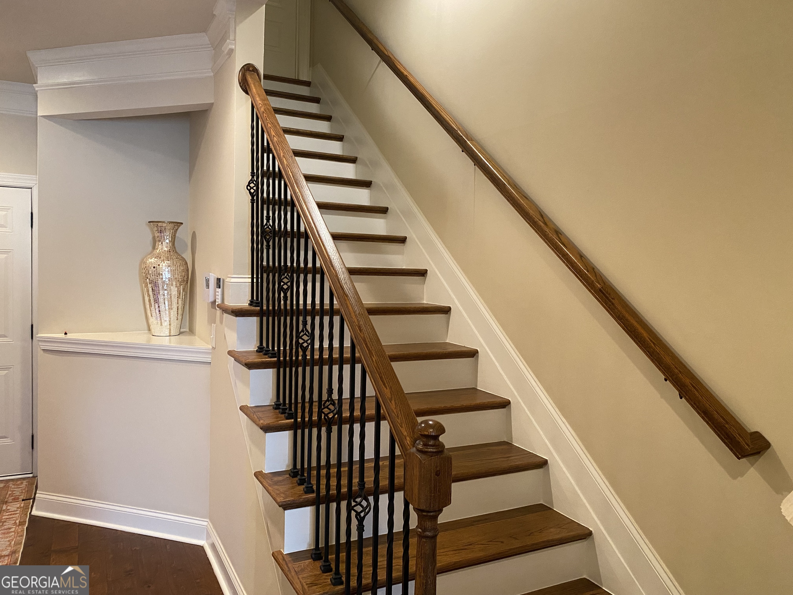 156 Elkins Boulevard Locust Grove, GA 30248 - Photo 8 of 36 a view of entryway with wooden floor