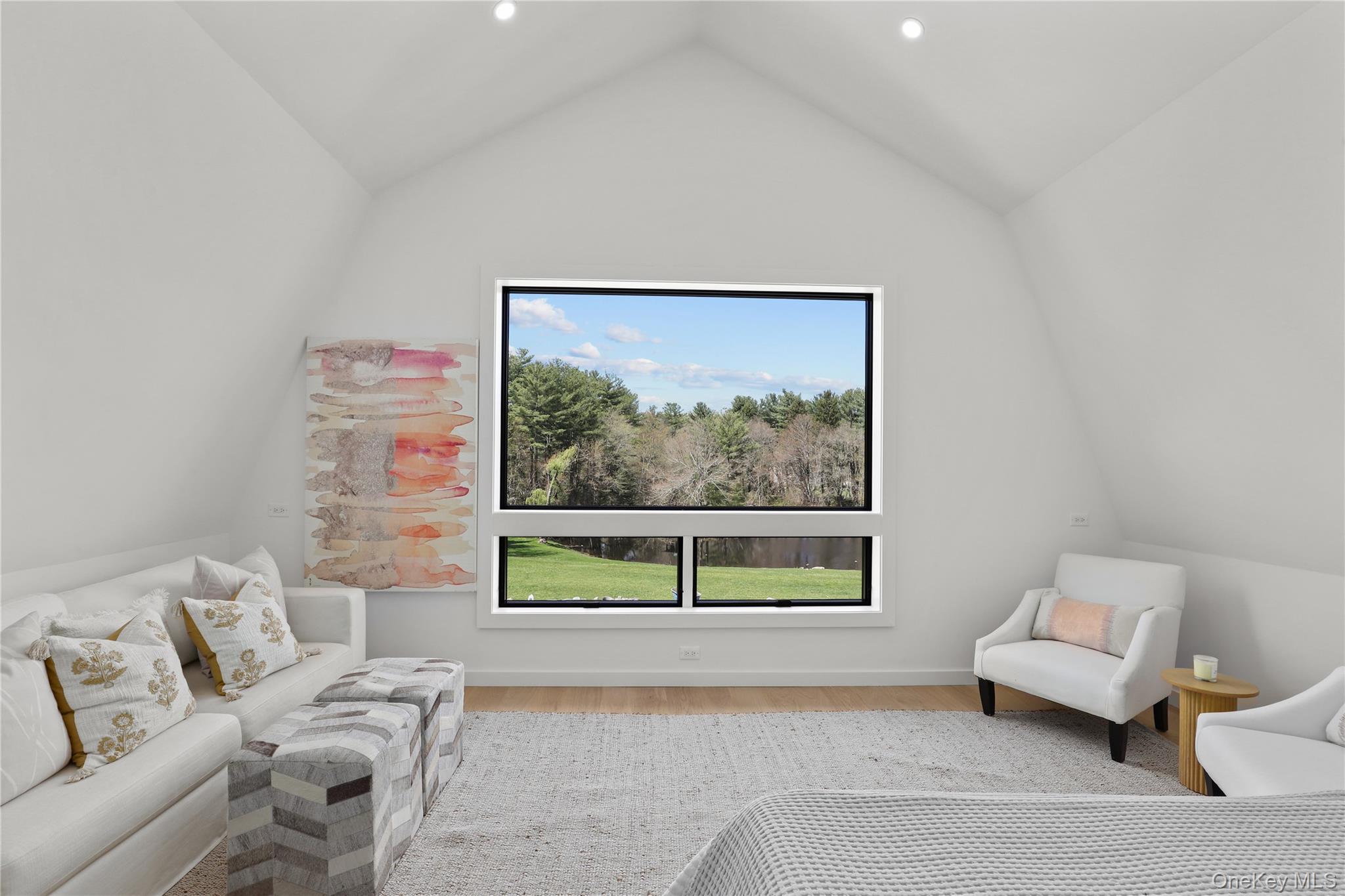 39 Old Snake Hill Road Pound Ridge, NY 10576 - Photo 26 of 37 a living room with furniture and a window