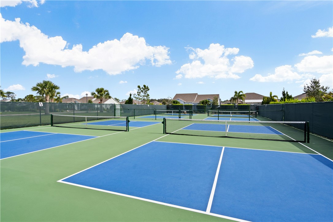 6045 Red Maple Manor Vero Beach, FL 32966 - Photo 30 of 36 a view of an outdoor space and tennis court
