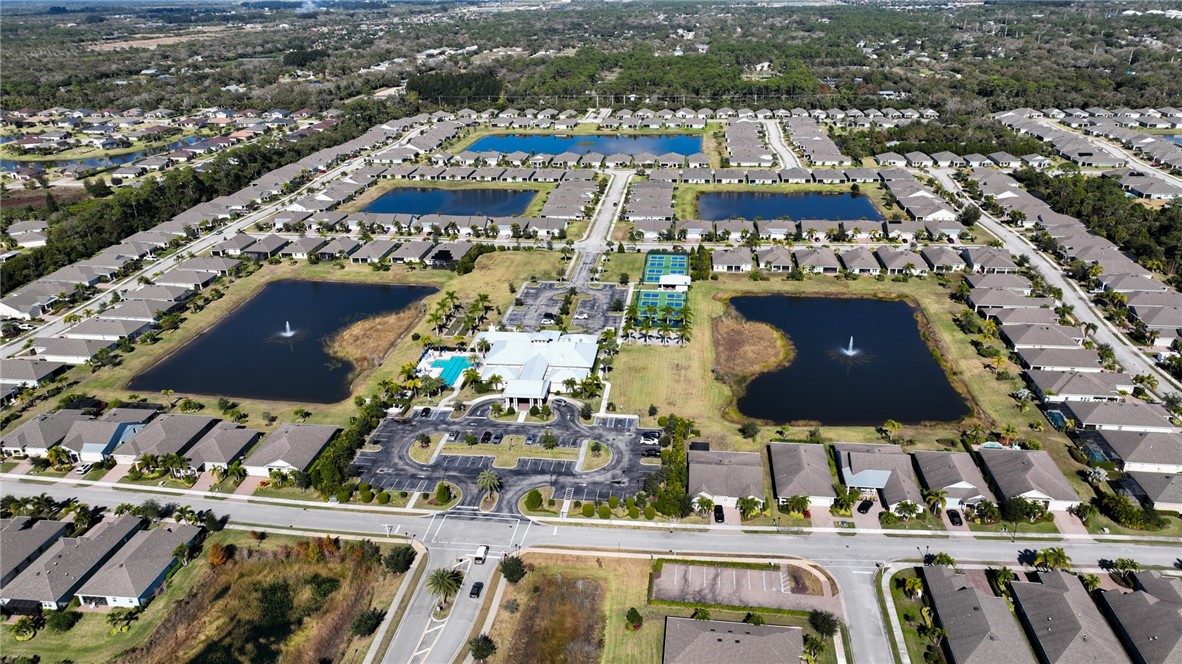 6045 Red Maple Manor Vero Beach, FL 32966 - Photo 36 of 36 an aerial view of houses with outdoor space