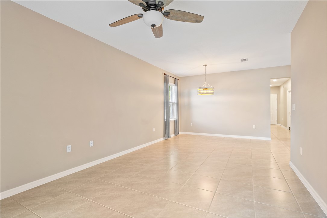 6045 Red Maple Manor Vero Beach, FL 32966 - Photo 7 of 36 a view of an empty room
