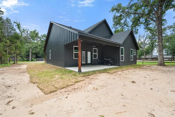 a house with trees in front of it