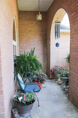 a front view of a house with outdoor space