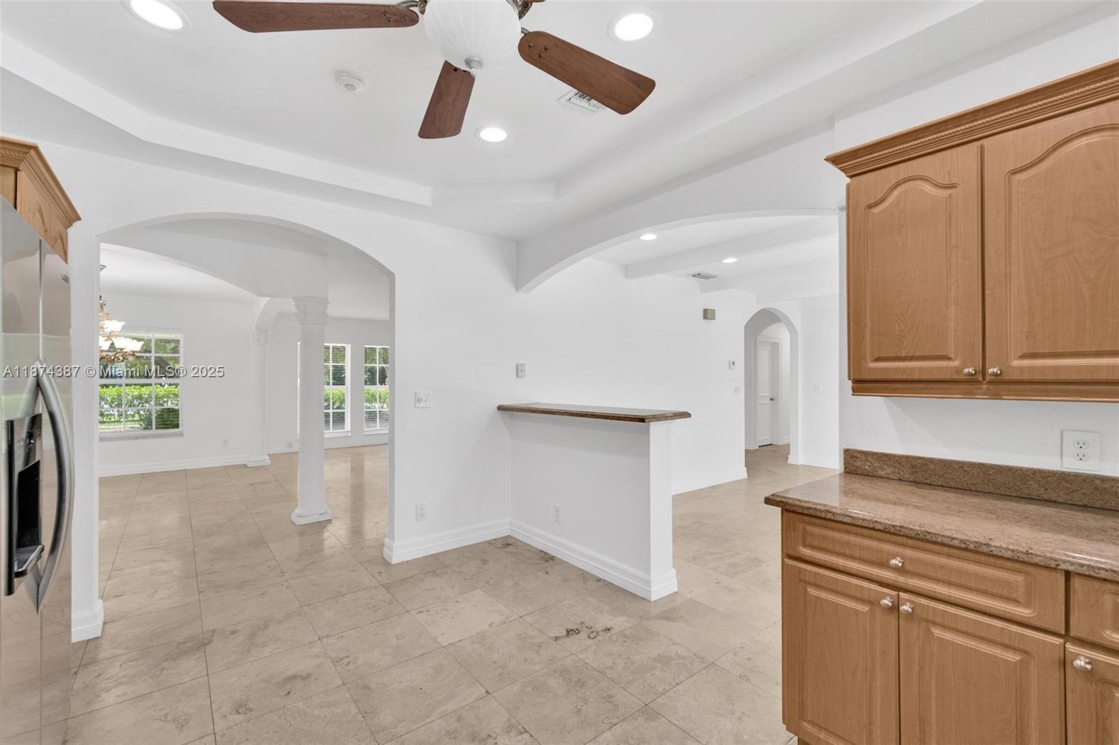 14780 Old Cutler Road, Unit 14780 Palmetto Bay, FL 33158 - Photo 9 of 16 a view of an empty room with window and wooden floor