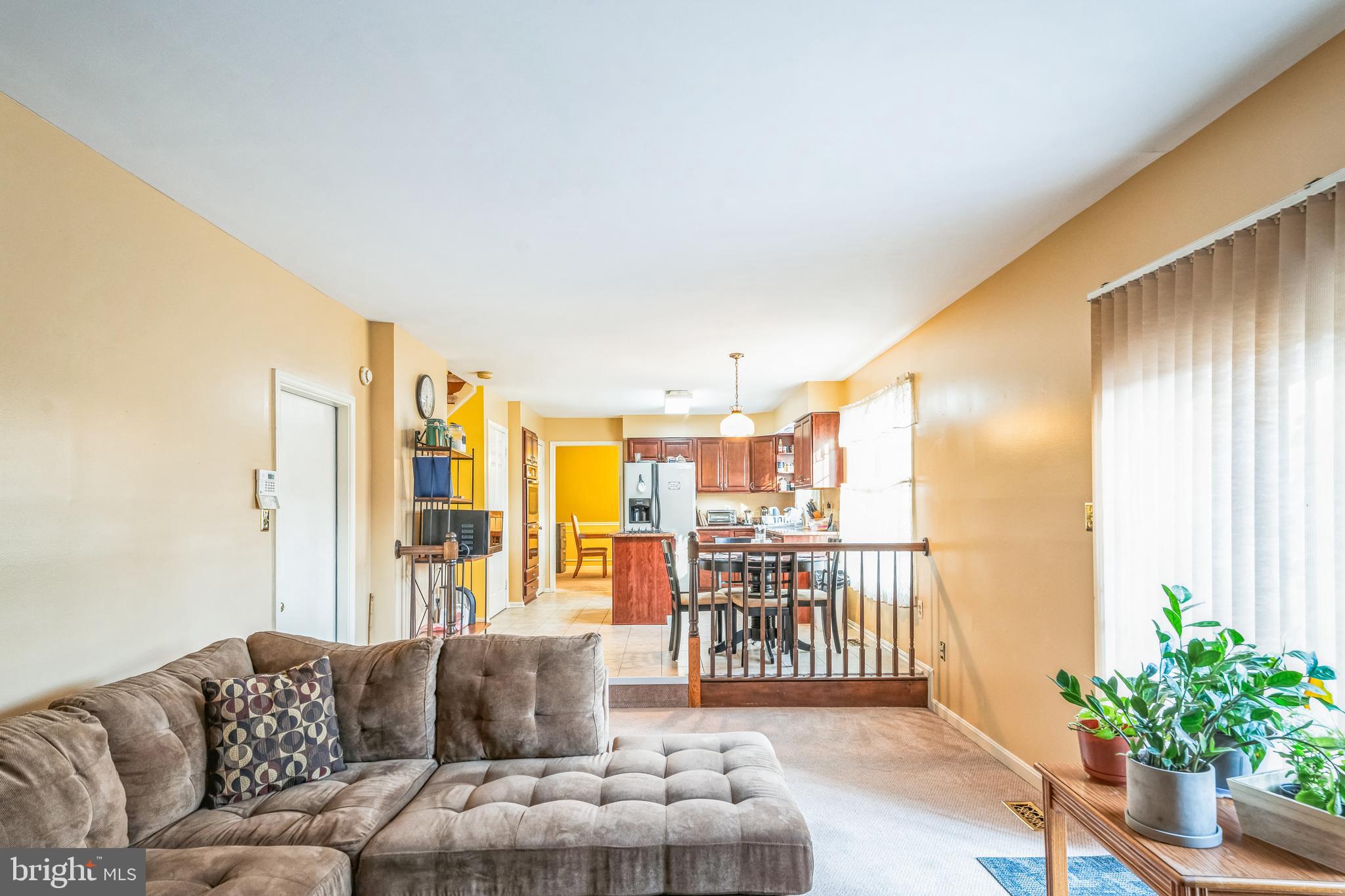 10401 Cleary Lane Bowie, MD 20721 - Photo 12 of 30 a living room with furniture and a potted plant