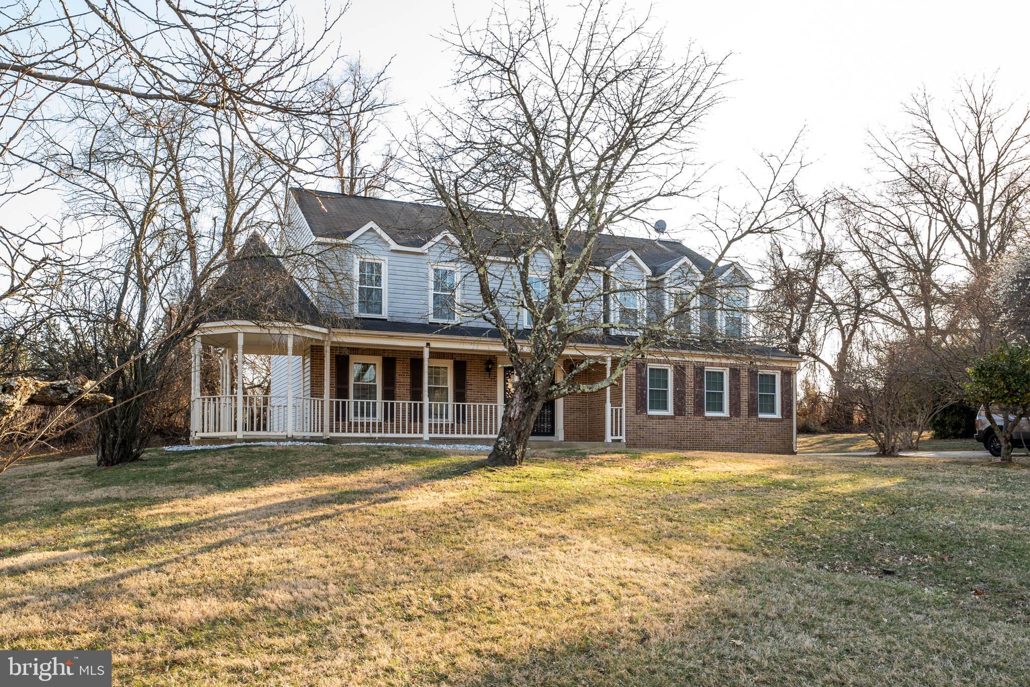 10401 Cleary Lane Bowie, MD 20721 - Photo 2 of 30 a front view of a house with a yard