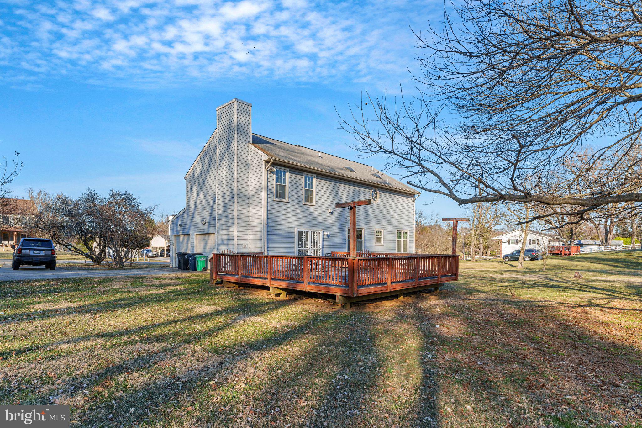 10401 Cleary Lane Bowie, MD 20721 - Photo 27 of 30 a view of a house with a yard and sitting area