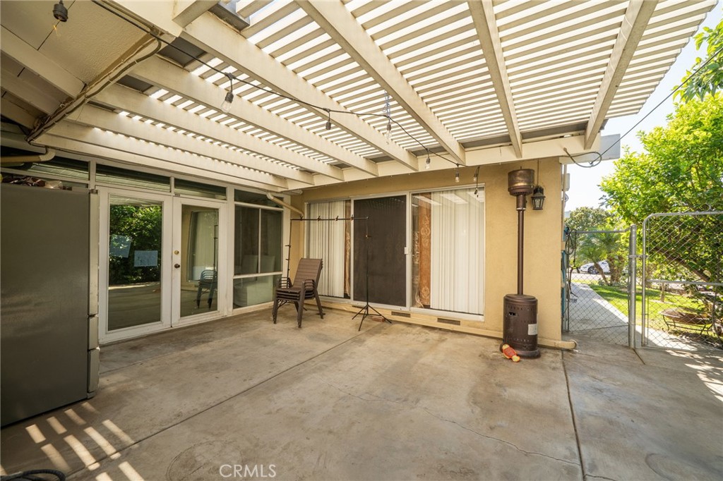 5035 Carlingford Avenue Riverside, CA 92504 - Photo 24 of 32 a view of a room with gym equipment and large windows
