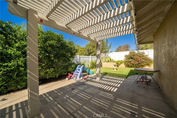 a view of a porch with wooden floor