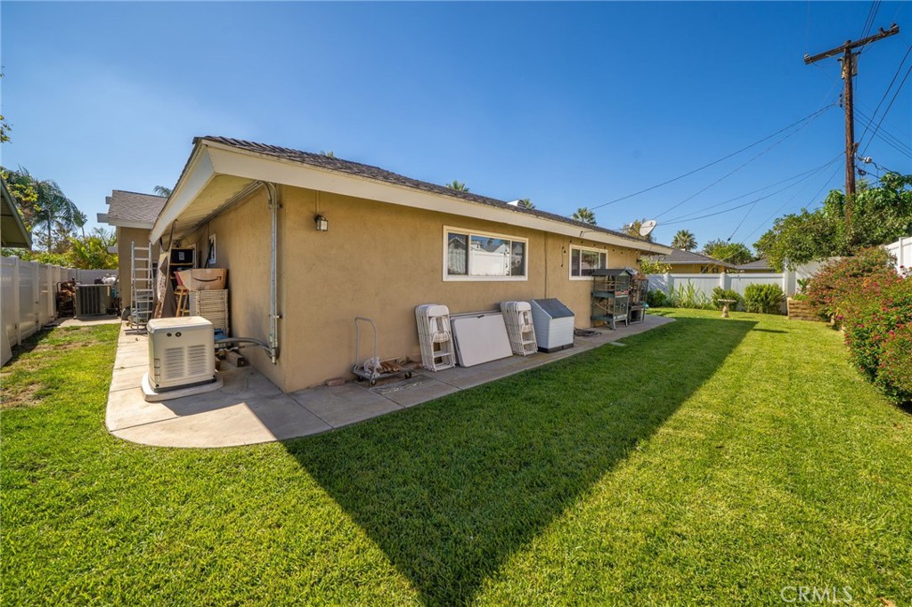5035 Carlingford Avenue Riverside, CA 92504 - Photo 29 of 32 a view of a backyard with plants and a patio