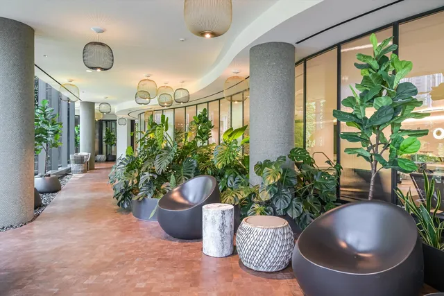 a view of balcony with two chairs and a table