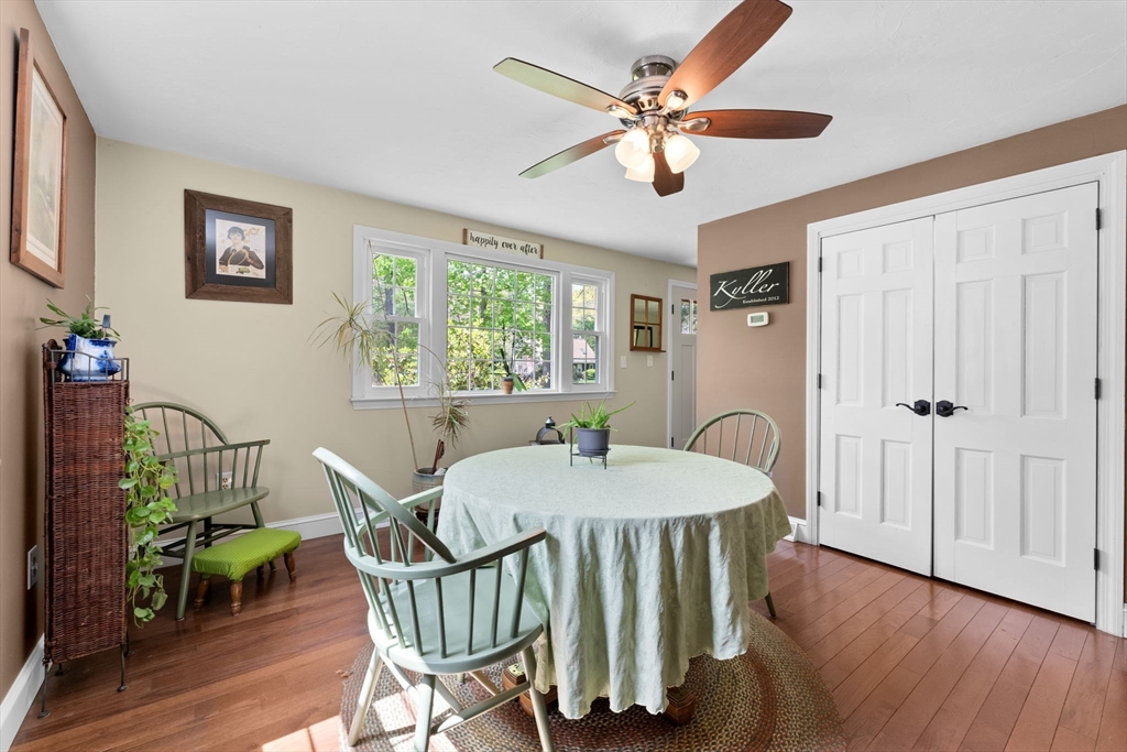 103 Maple Street Plympton, MA 02367 - Photo 14 of 41 a dining room with furniture a chandelier and wooden floor