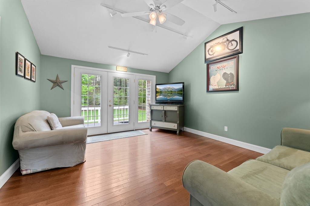 103 Maple Street Plympton, MA 02367 - Photo 16 of 41 a living room with furniture and a flat screen tv
