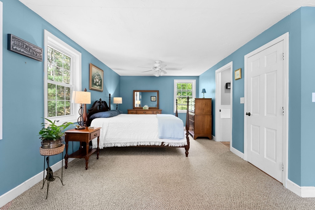 103 Maple Street Plympton, MA 02367 - Photo 22 of 41 a bed room with a bed and a window