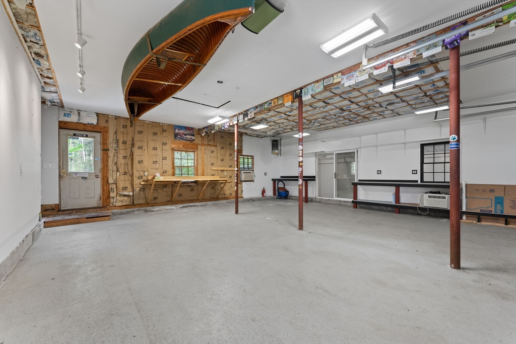 103 Maple Street Plympton, MA 02367 - Photo 30 of 41 a view of an empty room with a fireplace