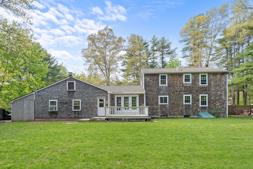 103 Maple Street Plympton, MA 02367 - Photo 38 of 41 a front view of a house with garden