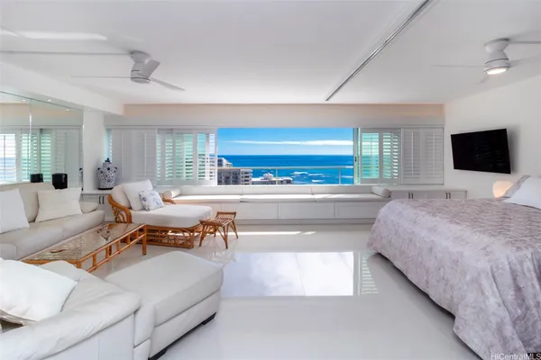 a living room with a couch and a flat screen tv