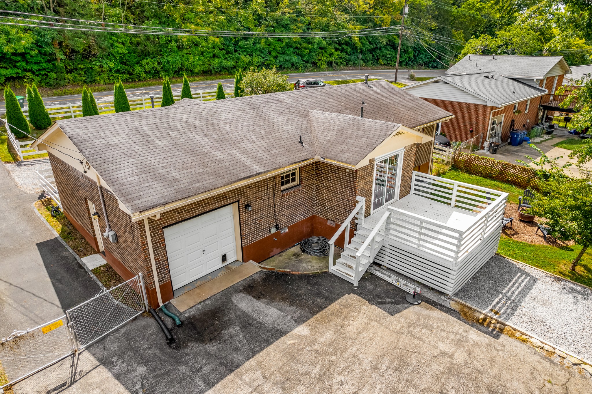 7979 Sawyer Brown Road Nashville, TN 37221 - Photo 19 of 25 an aerial view of a house with a yard