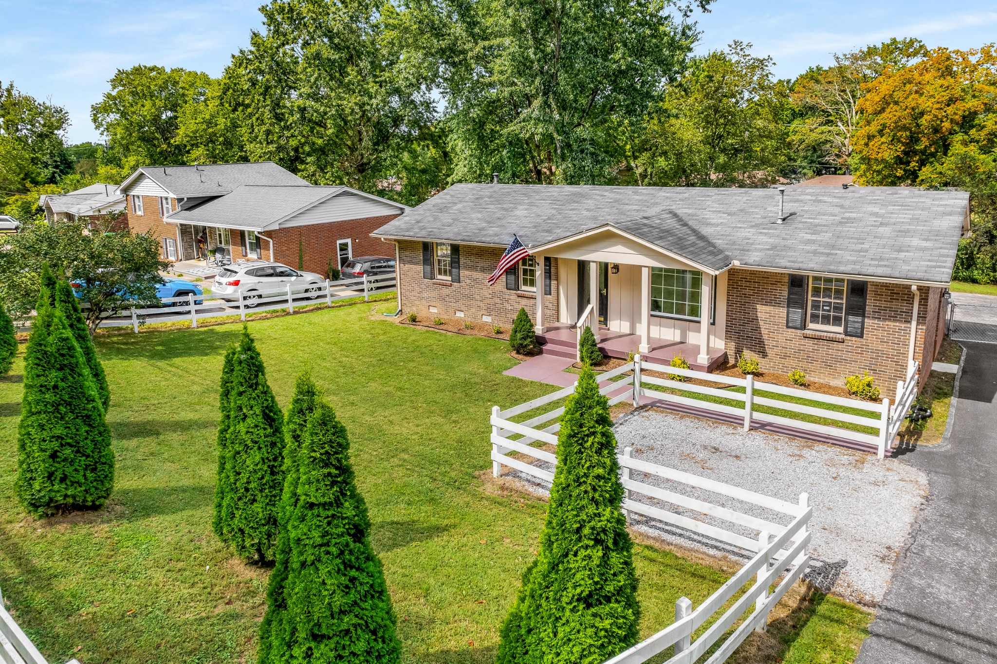 7979 Sawyer Brown Road Nashville, TN 37221 - Photo 3 of 25 a house with swimming pool in front of it