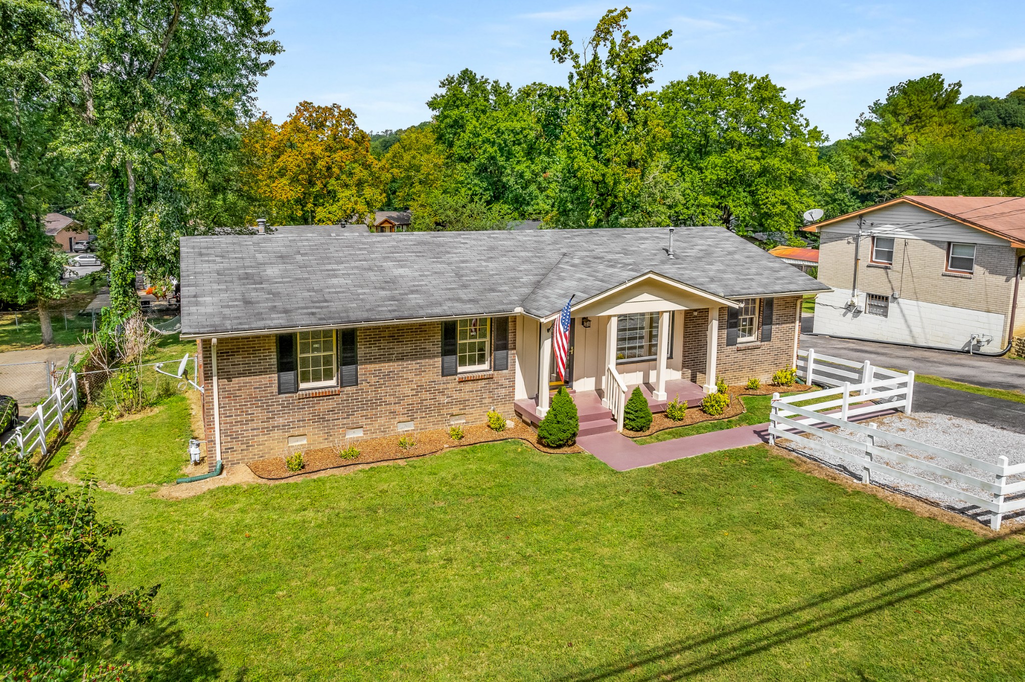 7979 Sawyer Brown Road Nashville, TN 37221 - Photo 4 of 25 an aerial view of a house with patio