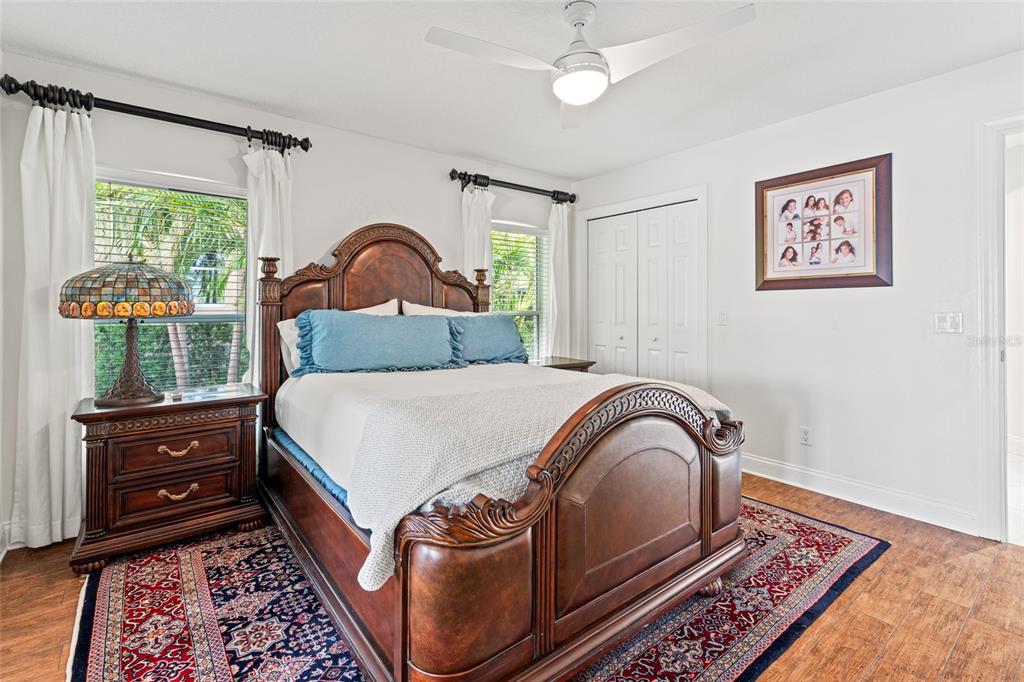 6315 Marbella Boulevard Apollo Beach, FL 33572 - Photo 23 of 83 a bedroom with a bed and a dresser