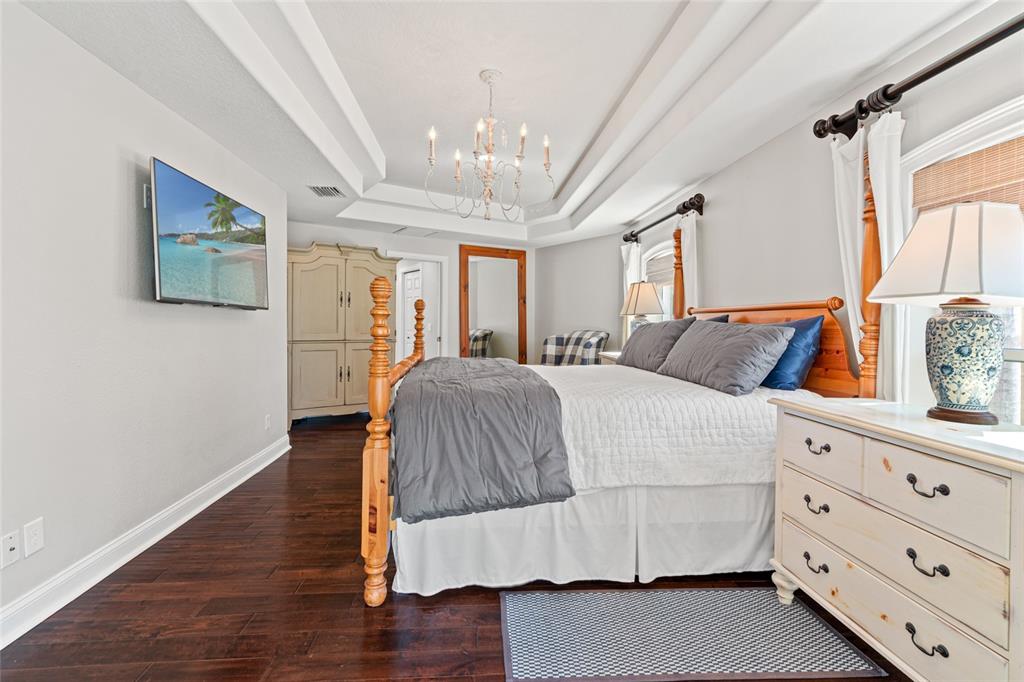 6315 Marbella Boulevard Apollo Beach, FL 33572 - Photo 28 of 83 a bedroom with a large bed and a window