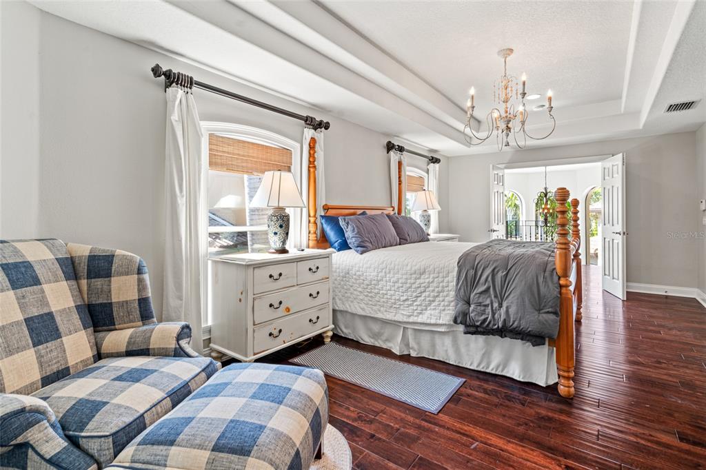 6315 Marbella Boulevard Apollo Beach, FL 33572 - Photo 29 of 83 a spacious bedroom with a bed and a dresser