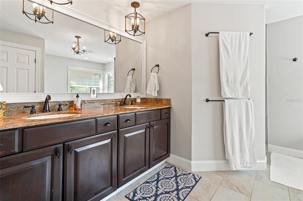 6315 Marbella Boulevard Apollo Beach, FL 33572 - Photo 30 of 83 a kitchen with a sink and a refrigerator