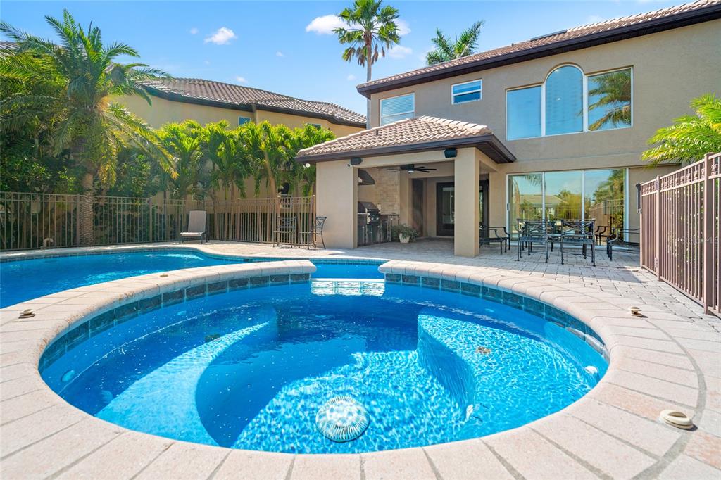 6315 Marbella Boulevard Apollo Beach, FL 33572 - Photo 49 of 83 a view of a swimming pool with a patio